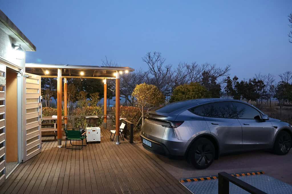 Tesla Cybertruck parked at dusk, illustrative reference photo by alex kim