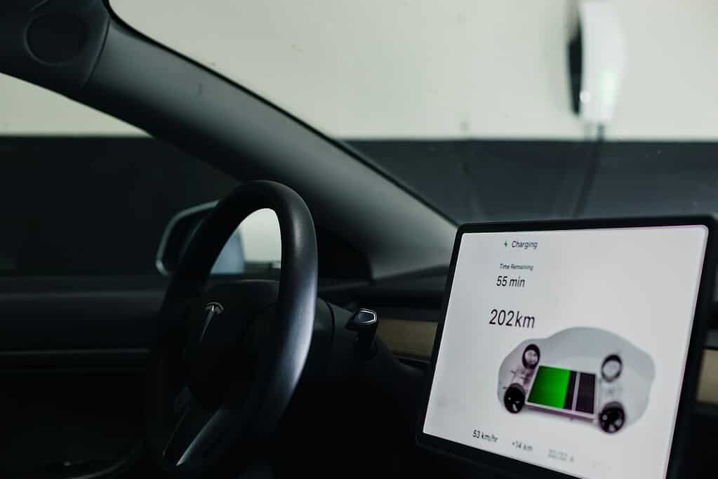 Illustrative archival photograph: Tesla dashboard display reference. Photo by Priscilla Du Preez on Unsplash; not an image of the October 2026 announcement.